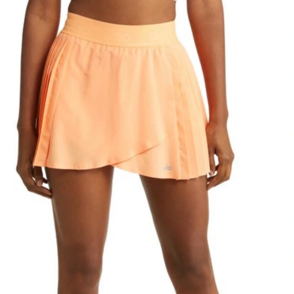NWT ALO Aces pleated Tennis Skirt size small - cantaloupe